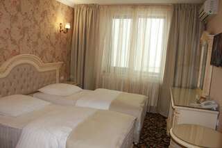 Отель Hotel Orient Braila Брэила Двухместный номер Делюкс с 2 отдельными кроватями-1